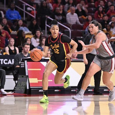 USC’s JuJu Watkins drives against Washington State’s Charlisse Leger-Walker on Friday at the Galen Center in Los Angeles.  (Courtesy of USC Athletics)