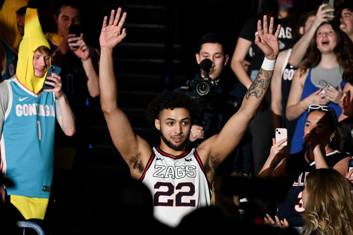 Gonzaga Bulldogs forward Anton Watson (22) reacts as he is honored for Senior Night before the first half of a college basketball game against the Santa Clara Broncos on Saturday, Feb. 24, 2024, at McCarthey Athletic Center in Spokane, Wash.  (Tyler Tjomsland/The Spokesman-Review)