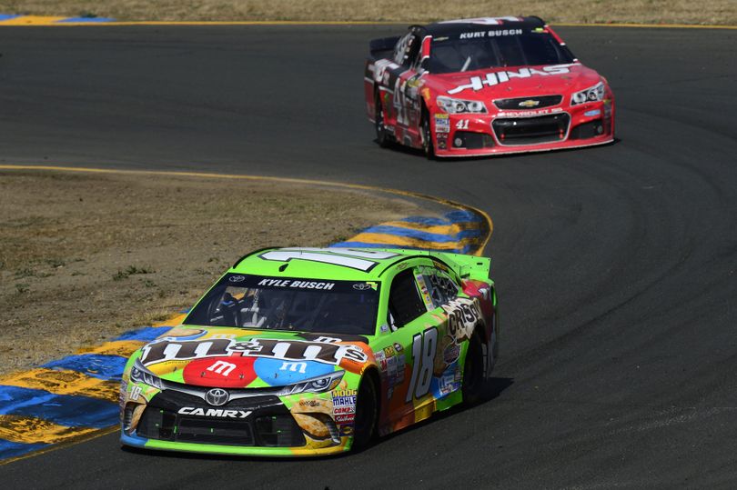 Kyle Busch, driver of the #18 M&M's Crispy Toyota, leads Kurt Busch, driver of the #41 Haas Automation Chevrolet, at the end of the NASCAR Sprint Cup Series Toyota/Save Mart 350 at Sonoma Raceway on June 28, 2015 in Sonoma, California. (Photo Credit: Robert Laberge/Getty Images) (Robert Laberge / Getty Images North America)