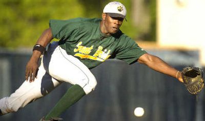 
A year ago at this time, Justin Upton was working out with his high school team.  
 (Associated Press / The Spokesman-Review)