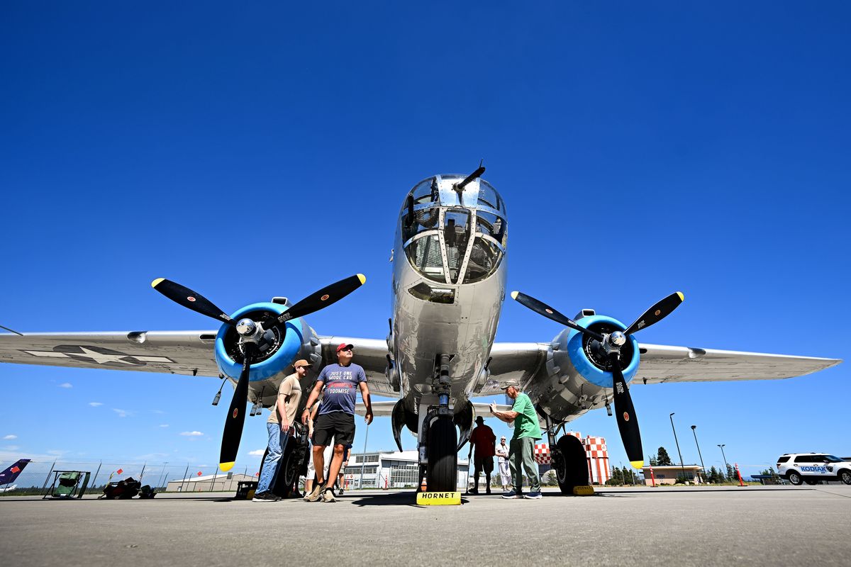 As part of the Flying Legends of Victory Tour, a World War II vintage North American B-25 Mitchell bomber is on display at Signature Aviation at the Spokane International Airport on Friday. The show runs through Sunday. A Boeing B-17 Flying Fortress is also on display for people to tour. Paid rides are available.  (COLIN MULVANY /THE SPOKESMAN-REVIEW)