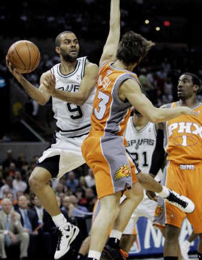 
San Antonio's Tony Parker, left, scored 26 points to help the Spurs down Phoenix in double overtime.Associated Press
 (Associated Press / The Spokesman-Review)