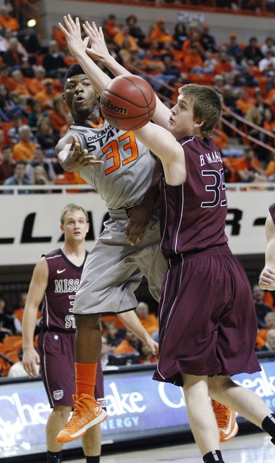 Freshman Marcus Smart has a well-rounded game for Oklahoma State. (Associated Press)