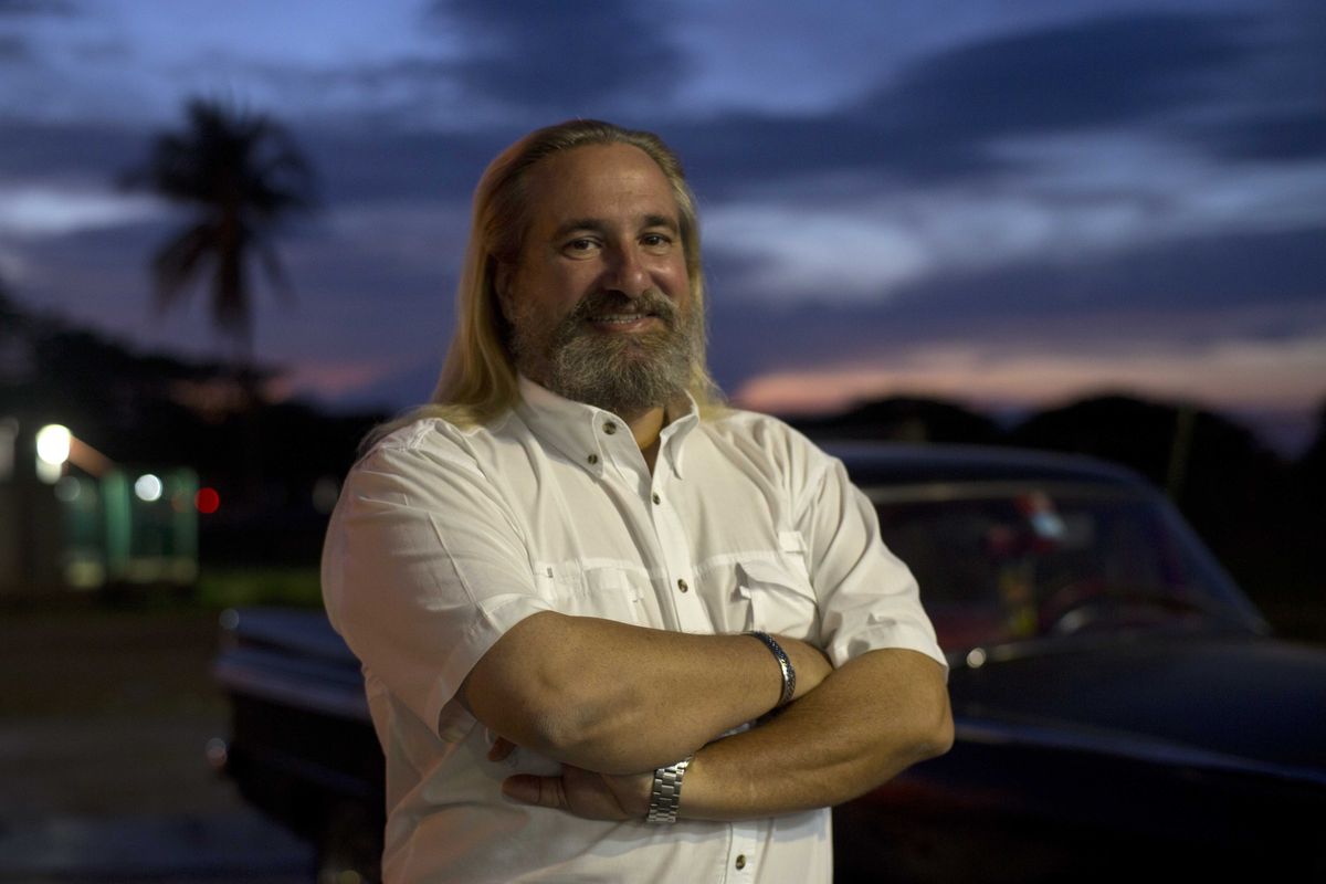 FILE - Fernando Gonzalez poses for a portrait in Havana, Cuba, March 5, 2014. Gonzalez, 60, who spent decades covering and directing major stories for The Associated Press across Latin America, died in Havana, Cuba late Sunday, Nov. 21, 2021 when he fell suddenly ill at his home.  (Ramon Espinosa)