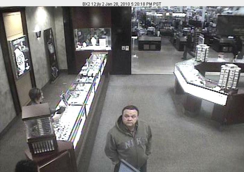Crime Stoppers is offering a reward for tips that help identify a suspected check forger.
The man pictured in the Nike sweatshirt is accused of cashing checks stolen from 1997 Dodge Dakota in the 3700 block of North Audubon between Jan. 31 and Feb. 1. A GPS device also was stolen from the car.
In the days following the break-in, the unidentified man forged and cashed checks totaling more than $1,2000 at Fred Meyer, Huckleberry's and other businesses. (Crime Stoppers)