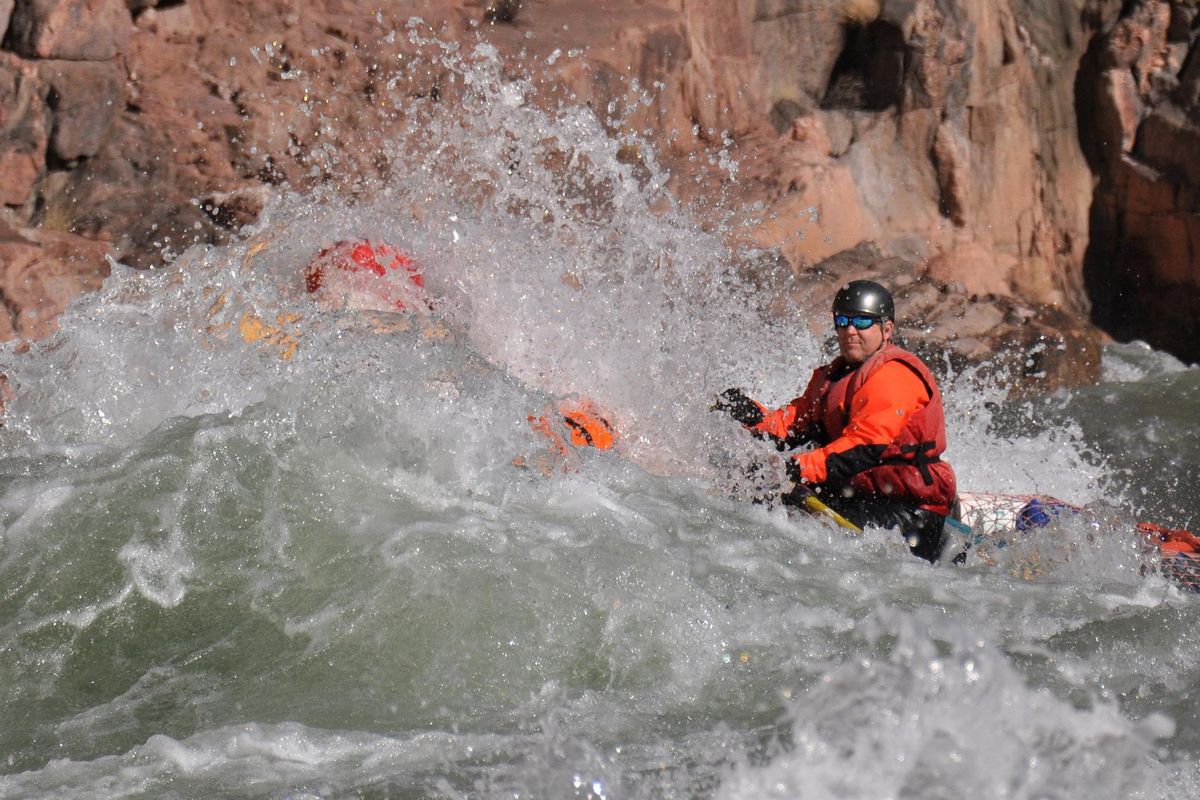 Rafter Brian Burns takes a line through Granite Rapid, one of 160 Colorado River rapids in Grand Canyon National Park. (Rich Landers / The Spokesman-Review)