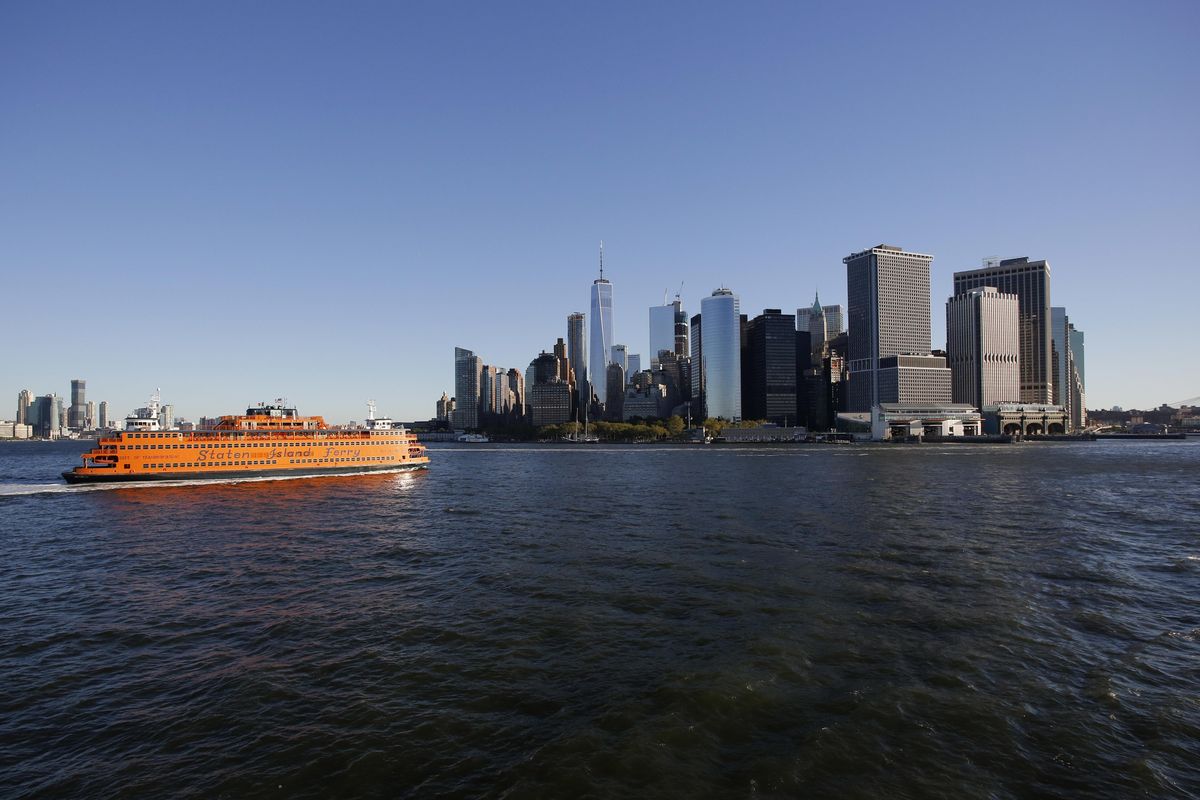 This Sept. 15, 2016,  photo shows the Staten Island Ferry approaching lower Manhattan in New York. Riding the Staten Island Ferry is one of New York City’s greatest free attractions, with wonderful views of Lower Manhattan and New York Harbor. (Mark Lennihan / AP)