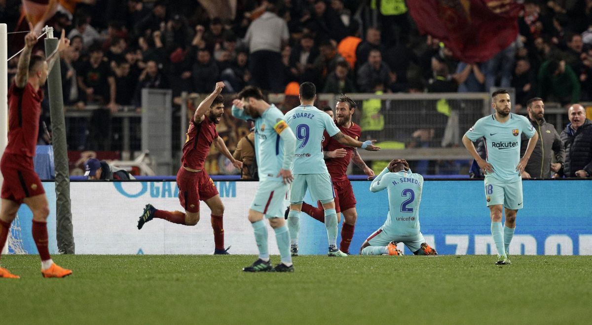 Players react after Roma’s Kostas Manolas scored his side’s 3rd goal, during the Champions League quarterfinal second leg soccer match between Roma and FC Barcelona at Rome’s Olympic Stadium, Tuesday, April 10, 2018. (Andrew Medichini / Associated Press)