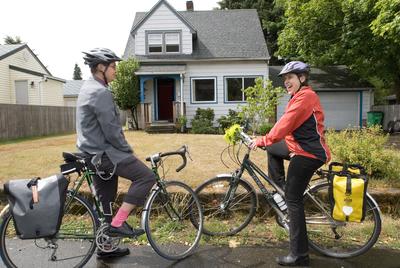 Kirsten Kaufman, right, an agent for Prudential Real Estate, and client Emily Gardner discuss a house for sale in Portland.   (Associated Press / The Spokesman-Review)