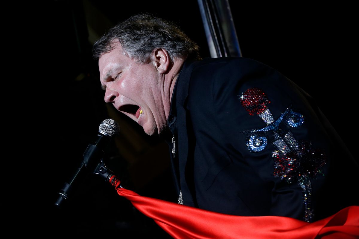 Singer Meat Loaf performs in support of Republican presidential candidate and former Massachusetts Gov. Mitt Romney at the football stadium at Defiance High School in 2012 in Defiance, Ohio.  (Charles Dharapak)