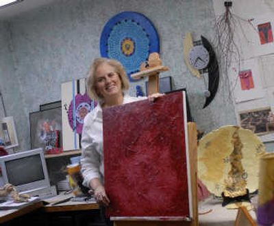 
Spokane Valley artist Paula Owens works at her home from an office where she can look into her 
