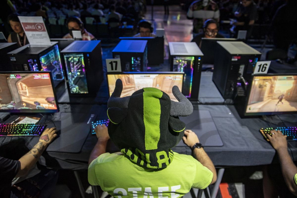 Attendees play a beta version of Overwatch 2 during the Activision Blizzard Inc. Overwatch League Battle For Texas tournament at Tech Port Arena in San Antonio, Texas, in May 2022.   (Sergio Flores/Bloomberg)