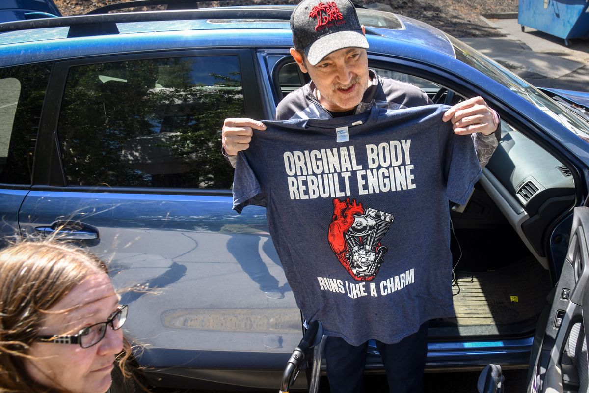 Greg Soumokil proudly shows off his new heart-themed tee shirt on May 21 in Spokane.  (DAN PELLE/THE SPOKESMAN-REVIEW)