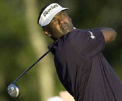 
Vijay Singh, with nine Tour victories, replaced Tiger Woods as the dominant player in golf while becoming the first golfer to earn more $10 million in a season. 
 (Associated Press / The Spokesman-Review)