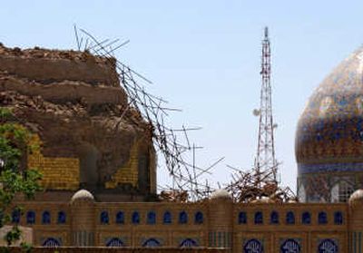 
A base of a destroyed minaret of the Golden Dome Shiite shrine in Samarra is seen after insurgents blew up the two minarets Wednesday. The  shrine's dome was destroyed in a bombing in 2006.Photos by Associated Press
 (Photos by Associated Press / The Spokesman-Review)