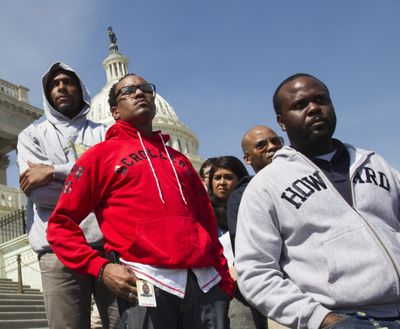 Congressional staff members and others join in the “Hoodies on the Hill” gathering on Capitol Hill in Washington on Friday to remember Trayvon Martin, the unarmed black teenager who was shot and killed on Feb. 26 in Sanford, Fla. (Associated Press)