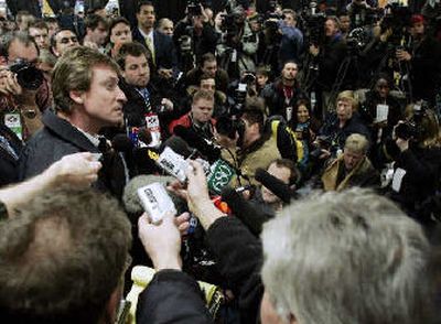 
Wayne Gretzky is the center of attention Monday in Toronto. 
 (Associated Press / The Spokesman-Review)