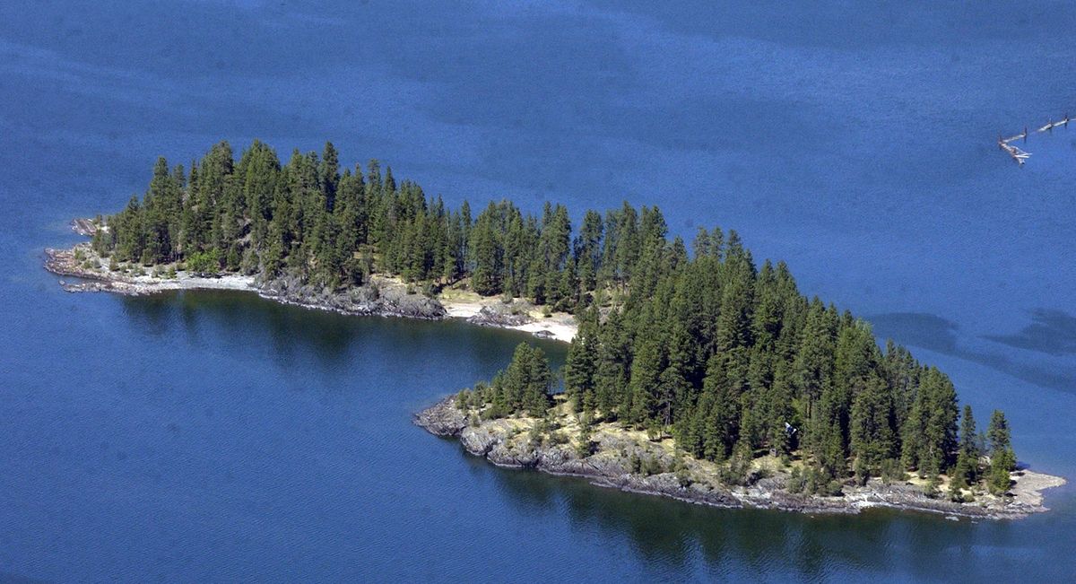 Memaloose Island, just off the shoreline near Hope, Idaho, in Lake Pend Oreille, is for sale. The owners hope someone will pay $7 million for the 13 acres. This view is looking northeast.  (JESSE TINSLEY)