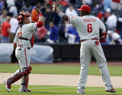 The Phillies welcomed back catcher Carlos Ruiz, left, after his 25-game suspension for using a banned amphetamine. (Associated Press)