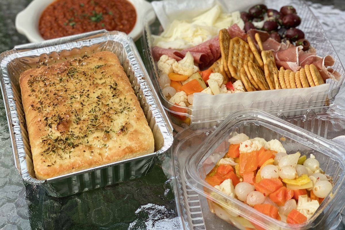 The new Tavola Calda at Commellini Estate in north Spokane offers appetizers including pickled vegetables, bread and charcuterie, pictured here in July.  (James Russell/For The Spokesman-Review)