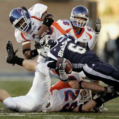 
Boise State coaches made several trips to Glenns Ferry to recruit Korey Hall, bottom of pile. 
 (Associated Press / The Spokesman-Review)