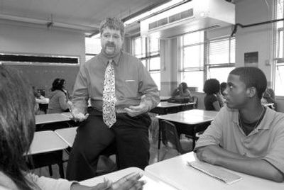 
Teacher David Sneed, a former restaurant manager, talks to students at Rabouin High School in New Orleans  on Jan. 12. 
 (Associated Press / The Spokesman-Review)