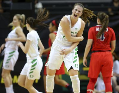 Oregon’s Sabrina Ionescu celebrates the first of her four 3-pointers against Arizona during an NCAA college basketball game in Eugene, Ore., Friday, Jan. 12, 2018. (Brian Davies / Register-Guard via AP)