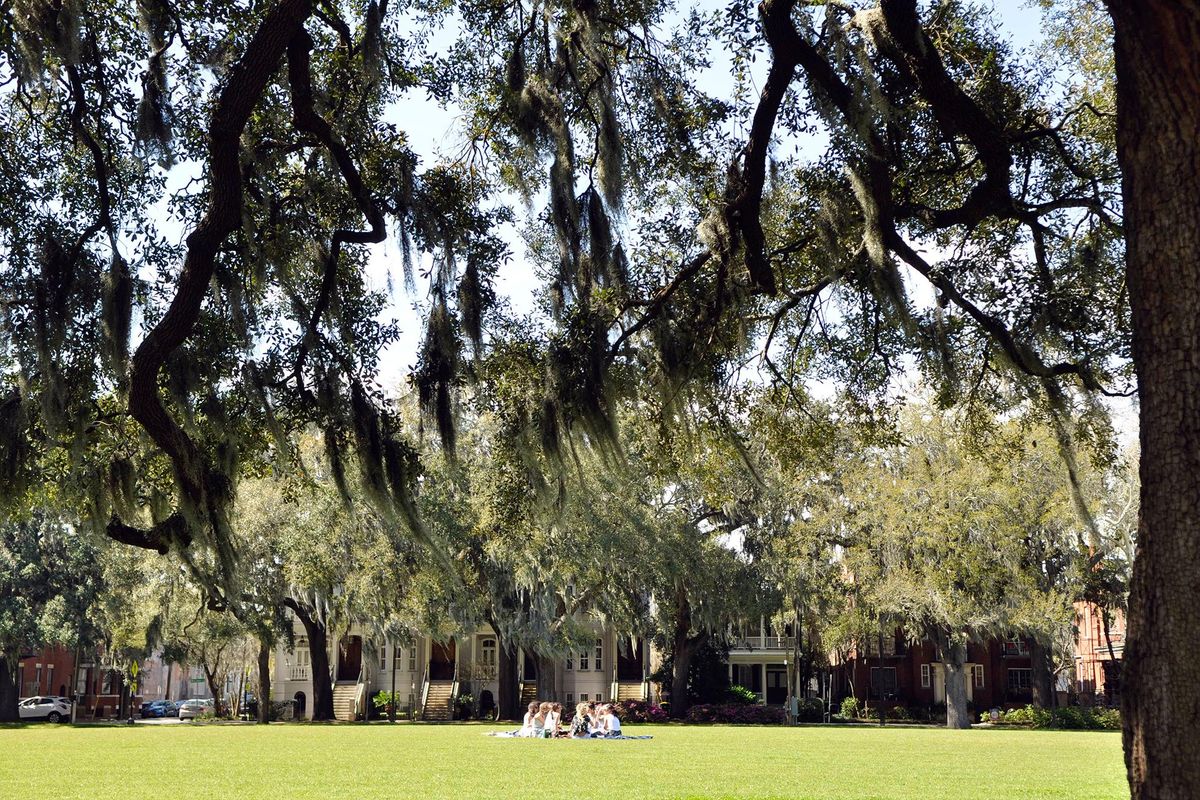 Mansions and other historic homes line Savannah’s Forsyth Park, a popular spot for picnicking, relaxing, playing ball and going for a run. (Adriana Janovich / The Spokesman-Review)