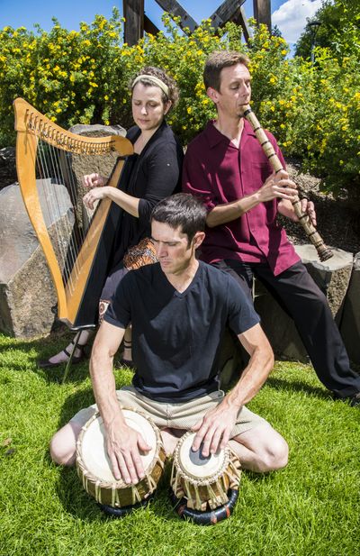 Ellicia and Todd Milne (in back) and Aaron Mark are musicians whose sound is ethereal and spiritual; world fusion instrumentals. (Colin Mulvany)