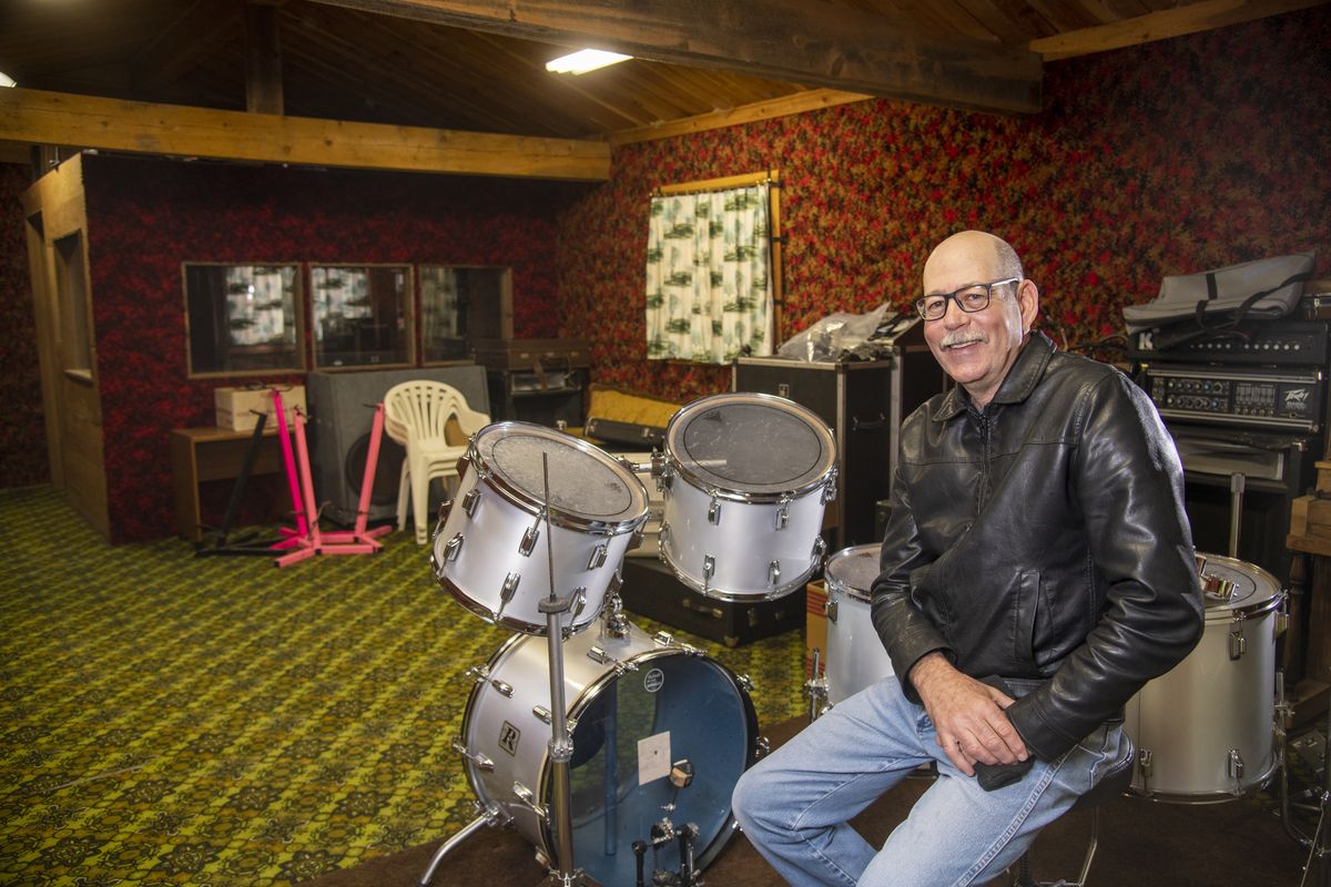 Joe Emerson, who lives a stone’s throw away, sits in the cozy cabin that his father built for him and his brother Donnie when they were high school students making music on the family farm in the late 1970s in Fruitland, Washington, shown Thursday, Oct. 20, 2022. The album they produced there, was an amateur effort filled with teen angst and hook-laden melodies that has caught the ear of record collectors across the nation. With the new interest, there is now a feature film about their lives.  (Jesse Tinsley/THE SPOKESMAN-REVIEW)