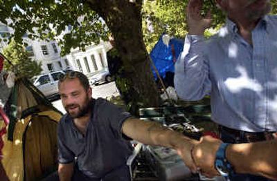 
Joseph Bay shakes hands with Dave 