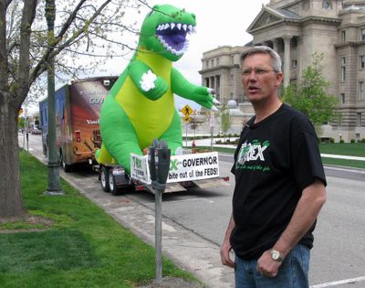 Rex Rammell campaigns for governor of Idaho in 2010 with the help of a giant inflatable T-Rex dinosaur and a decorated RV; Rammell, disgusted with Idaho politics, is now moving to Wyoming. (Betsy Russell / The Spokesman-Review)
