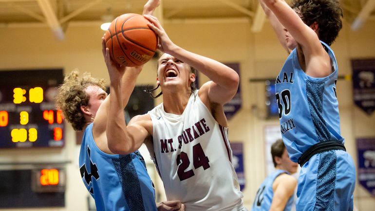 Mt. Spokane's Tyson Degenhart goes to the rim against Central Valley on Jan. 7, 2019. Degenhart signed his letter of intent for Boise State on Wednesday, Nov. 11, 2020. (Libby Kamrowski)