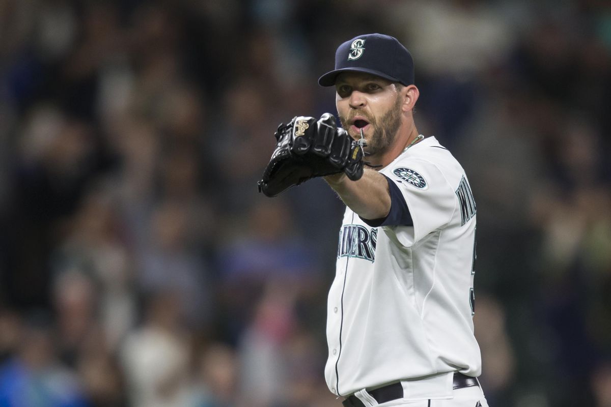 Seattle Mariners pitcher Tom Wilhelmsen gestures to the dugout after earning a save in baseball game against the Oakland Athletics, Tuesday, Aug. 25, 2015, in Seattle. (Stephen Brashear / Associated Press)