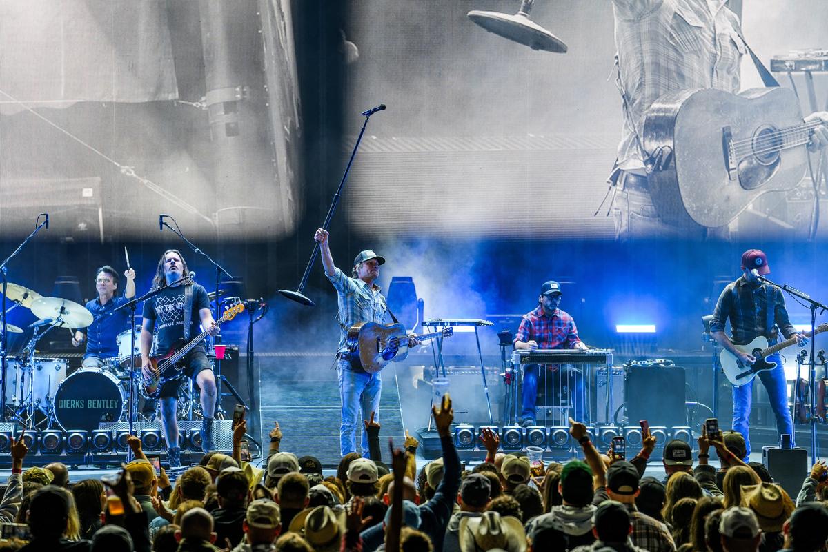 Country star Dierks Bentley holds the microphone up for a crowd of fans at Northern Quest Resort and Casino as they sing back to one of his many platinum hits on Friday.   (Jordan Tolley-Turner/The Spokesman-Review)