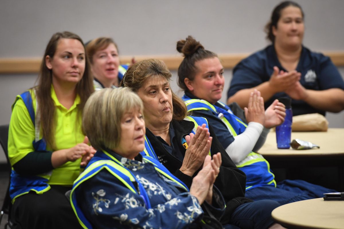 Bus drivers gather for a training class for all Durham School Services drivers in de-escalation tactics Tuesday. A total of around 300 drivers attended the training. (Dan Pelle / The Spokesman-Review)