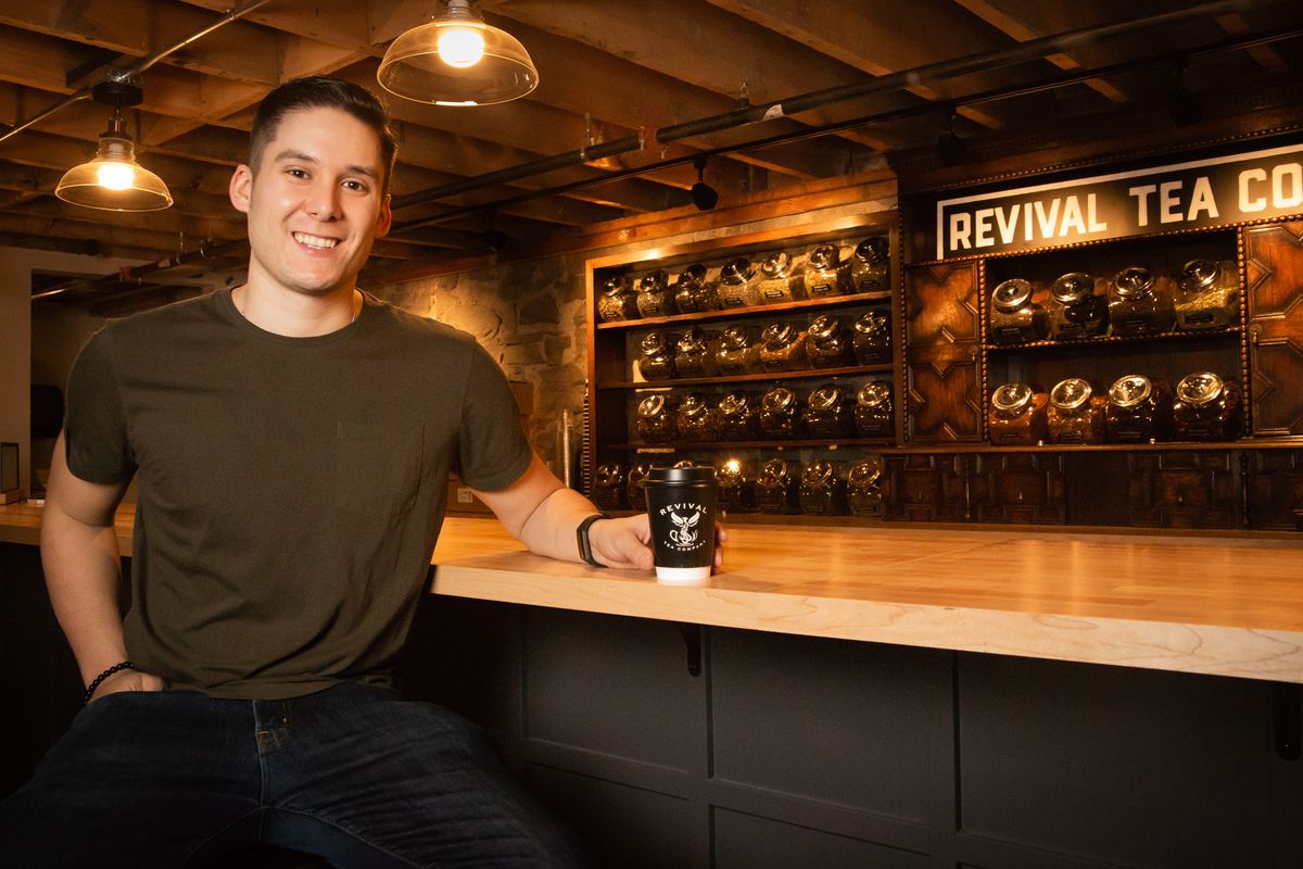 Drew Henry stands in the brick-and-mortar shop for his business, Revival Tea Co., on Feb. 6, 2020. Henry said that Revival has been in the tea business for shipping wholesale all over the world for years, but the speakeasy-inspired space at 415 W. Main Ave. will be the first tea shop of its kind in Spokane.  (Libby Kamrowski/The Spokesman-Review)