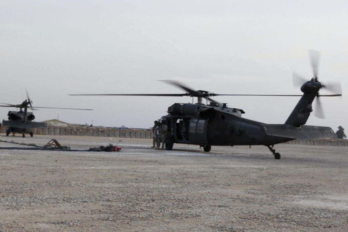 A U.S. Army Black Hawk helicopter seen at the Operating Site Echo, in Diwaniyah, 120 kilometers (80 miles) south of Baghdad, Iraq, Wednesday, Dec. 14, 2011. (Hadi Mizban / AP)