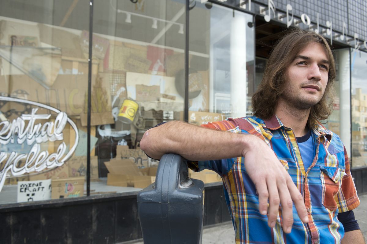 Artist Austin Stiegemeier has filled an empty storefront window at 1011 W. First Ave. in downtown Spokane with art on recycled materials. The installation is a commentary on the way homeless people are treated in downtown Spokane. (Jesse Tinsley)