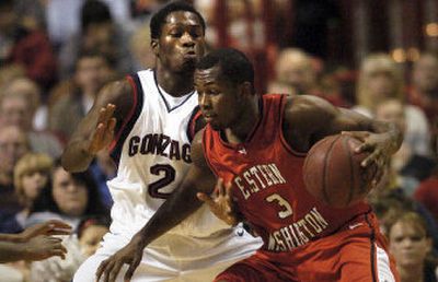 
Eastern Washington's Rodney Stuckey, driving against Gonzaga's Jeremy Pargo last month, is the Big Sky Conference men's basketball player of the week. 
 (File/Associated Press / The Spokesman-Review)