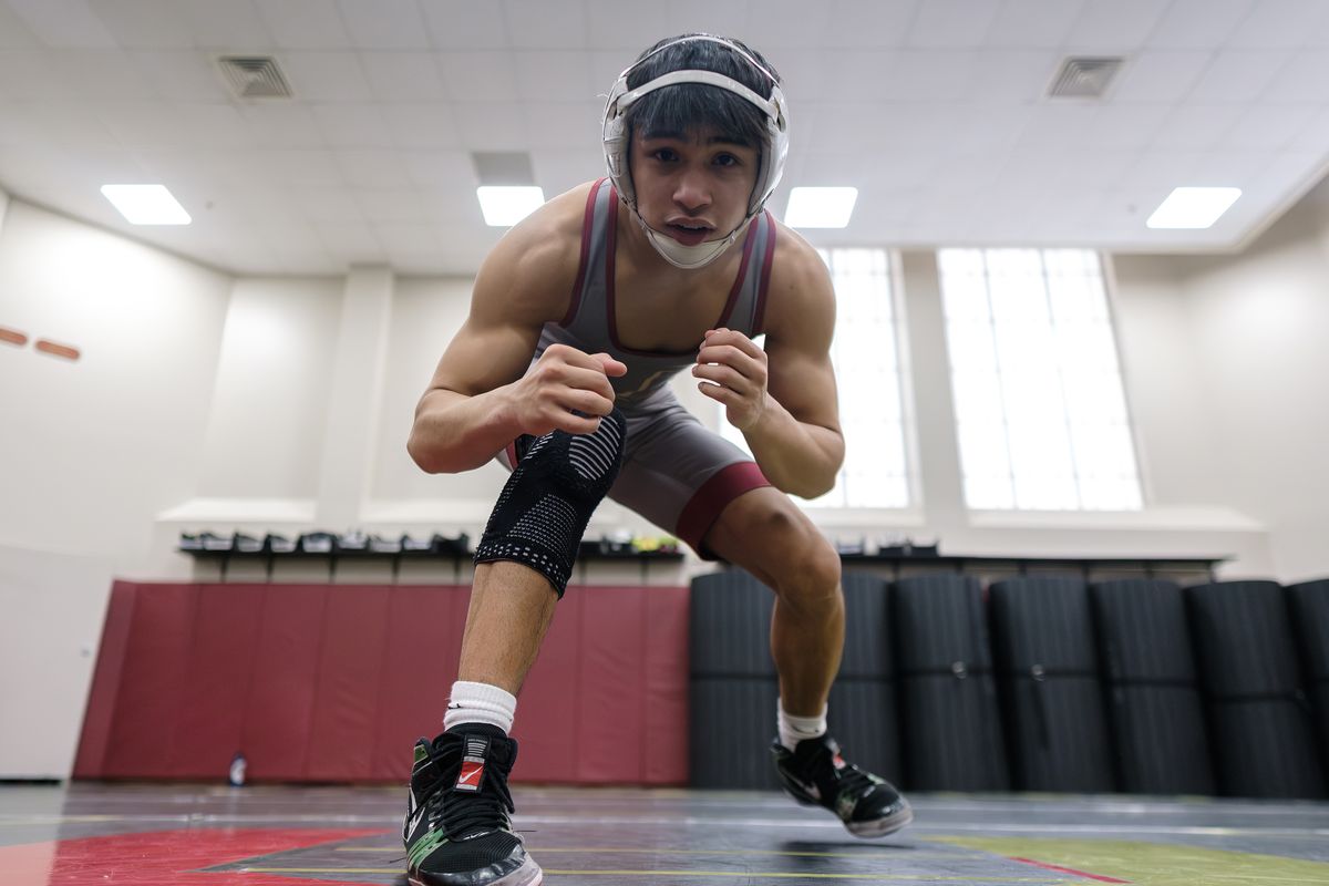 University wrestler Czar Quintanilla poses after practice on Monday at University High School in Spokane Valley. Quintanilla is seeking his fourth straight Mat Classic title this weekend in Tacoma.  (By Madison McCord/For The Spokesman-Review)