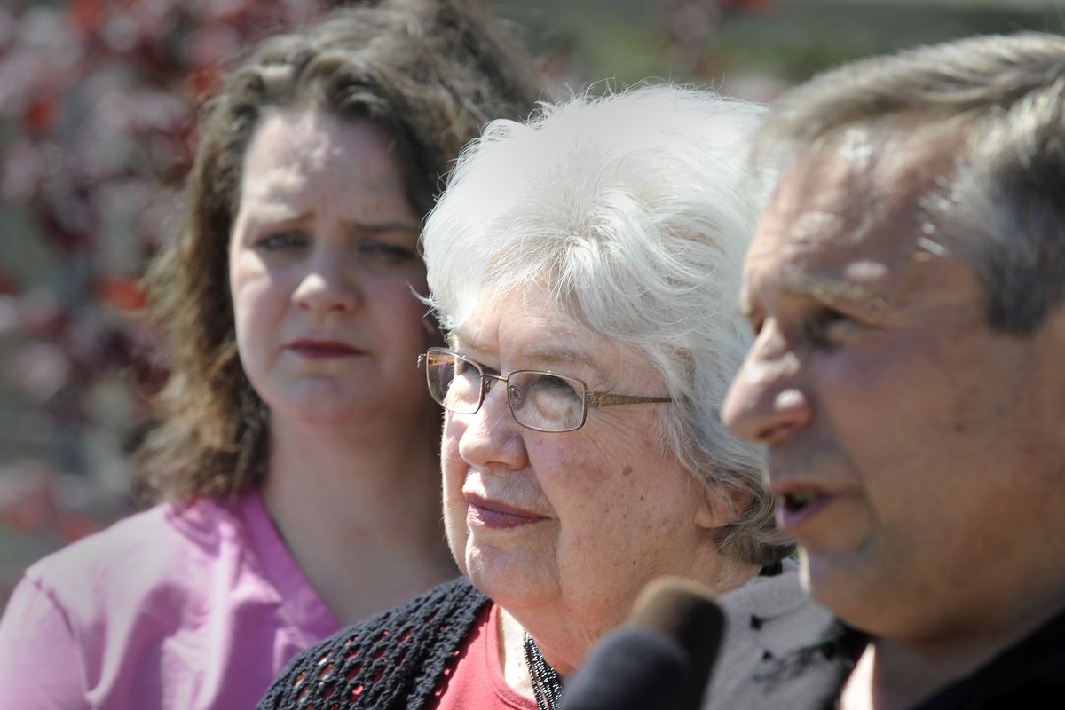Imogene Creach, center, stands with son Alan Creach, right, and other family members at a news conference Wednesday near the spot where Wayne Scott Creach was killed by a Spokane County sheriff’s deputy at The Plant Farm in the Spokane Valley. (Christopher Anderson)