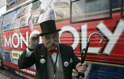 
In this February  2008 file photo, an actor portraying Mr. Monopoly for Hasbro poses for a photo at the American International Toy Fair in New York. Hasbro Inc. on Monday said its earnings rose 14 percent in the first quarter on growth in brands such as Transformers and Littlest Pet Shop. Associated Press
 (Associated Press / The Spokesman-Review)