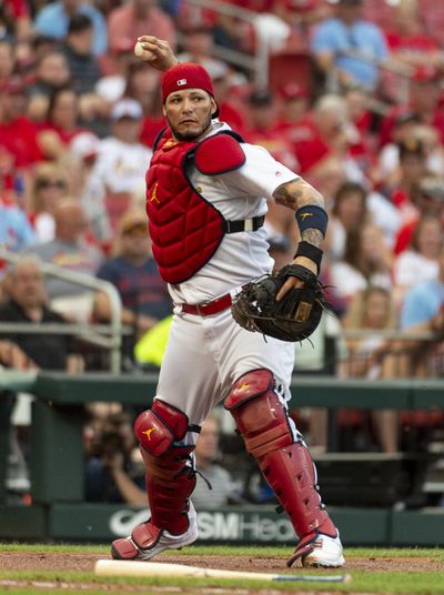 St. Louis Cardinals catcher Yadier Molina throws to first during the fourth inning of a baseball game against the Miami Marlins, Thursday, June 20, 2019, in St. Louis. (L.G. Patterson / Associated Press)