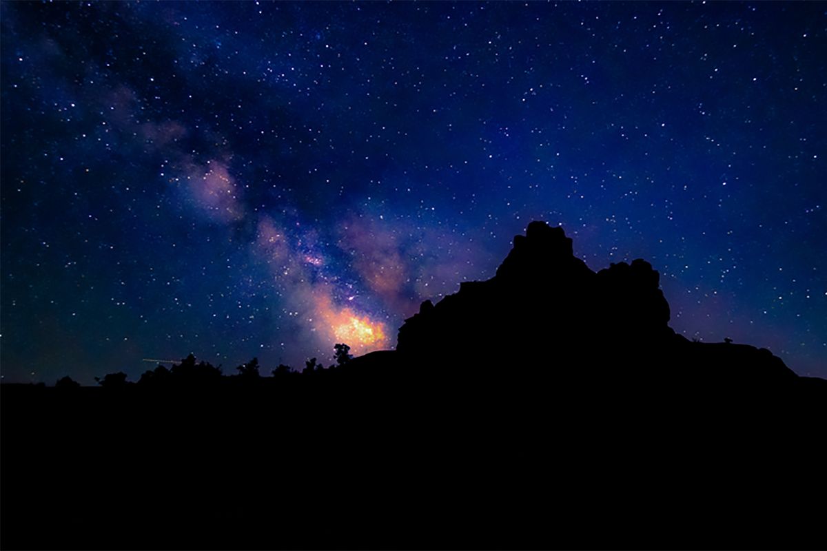 The Milky Way above Bell Rock, which is near Sedona, Ariz., where Matt High, the photographer, is the director of adventures and activities at Enchantment Resort’s Trail House. Among the programs there is stargazing.  (Courtesy of MATT HIGH)