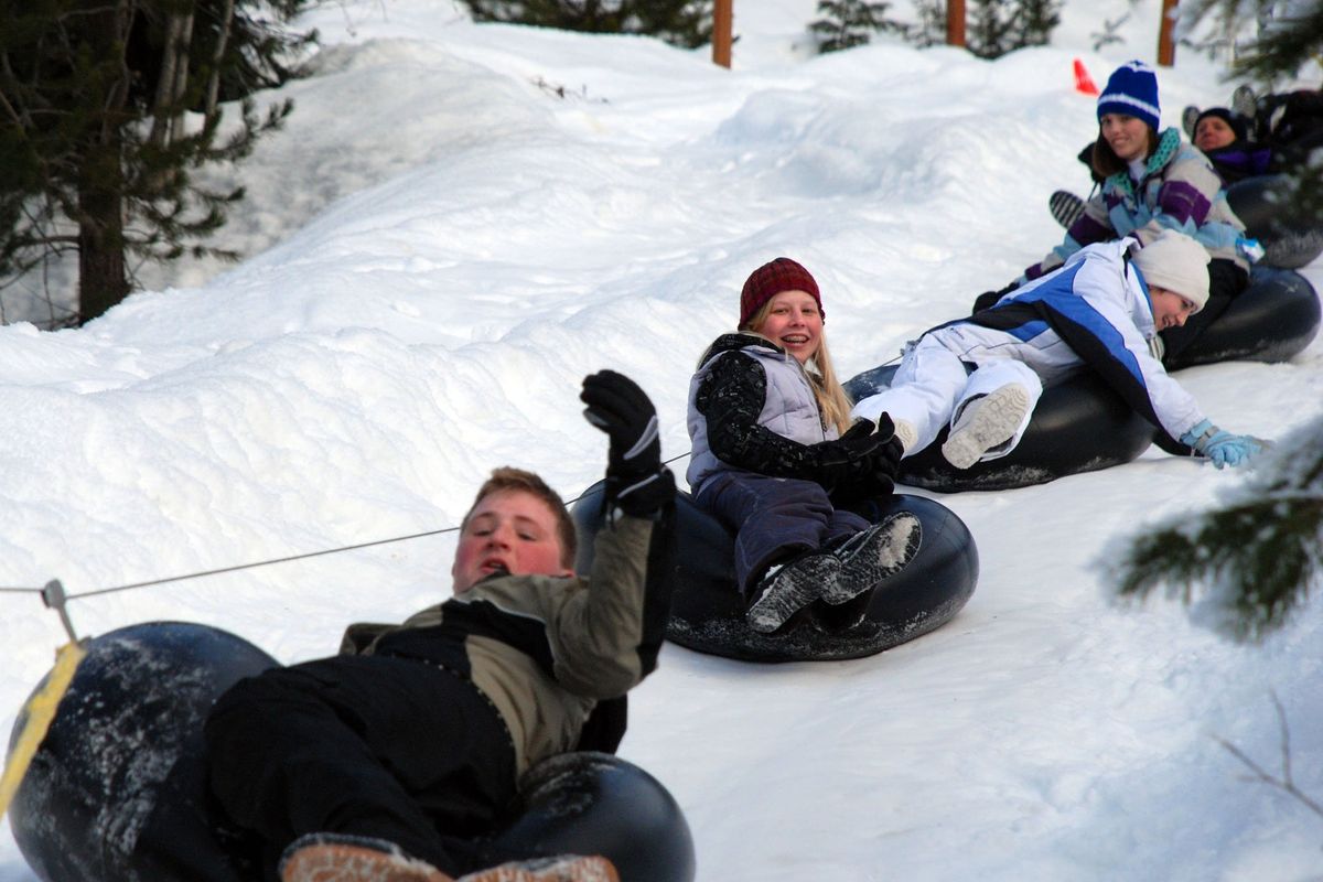 Inner tubers enjoy the lift to the top of the inner tubing hill at Bear Creek Lodge on Mount Spokane in 2009.  (Rich Landers/The Spokesman-Review)