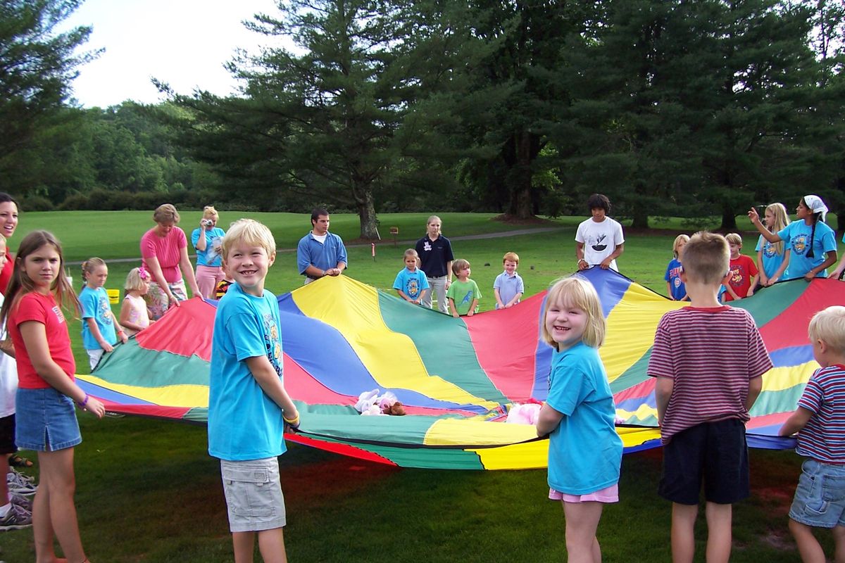 Two of Guy and Nancy Hargrove’s grandchildren, young Guy, 7, and Maggie, 4, participate in the 2004 Teddy Bear Picnic Games at High Hampton Inn in North Carolina. (Nancy Hargrove / Tribune News Service)