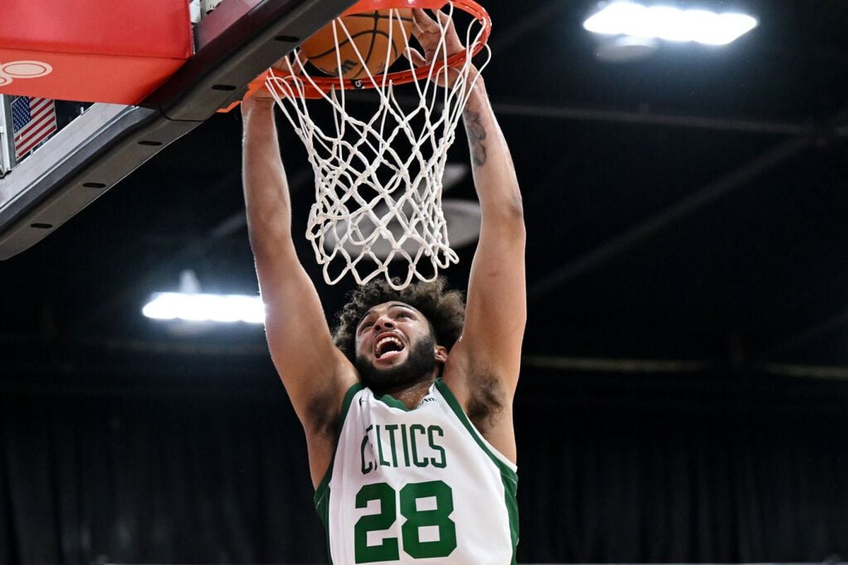 Boston forward Anton Watson dunks against Miami during an NBA Summer League matchup on July 13 at Cox Pavilion in Las Vegas.  (Tyler Tjomsland / The Spokesman-Review)