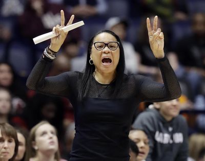 In this March 2, 2018, file photo, South Carolina head coach Dawn Staley yells to her players in the first half of an NCAA college basketball game against Tennessee at the women’s Southeastern Conference tournament, in Nashville, Tenn. (Mark Humphrey / Associated Press)