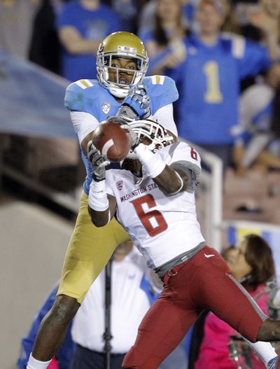 WSU’s Damante Horton (6) leads the Pac-12 with four interceptions. (Associated Press)
